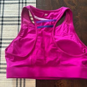 NWOT Fabletics bra top, magenta, size large.